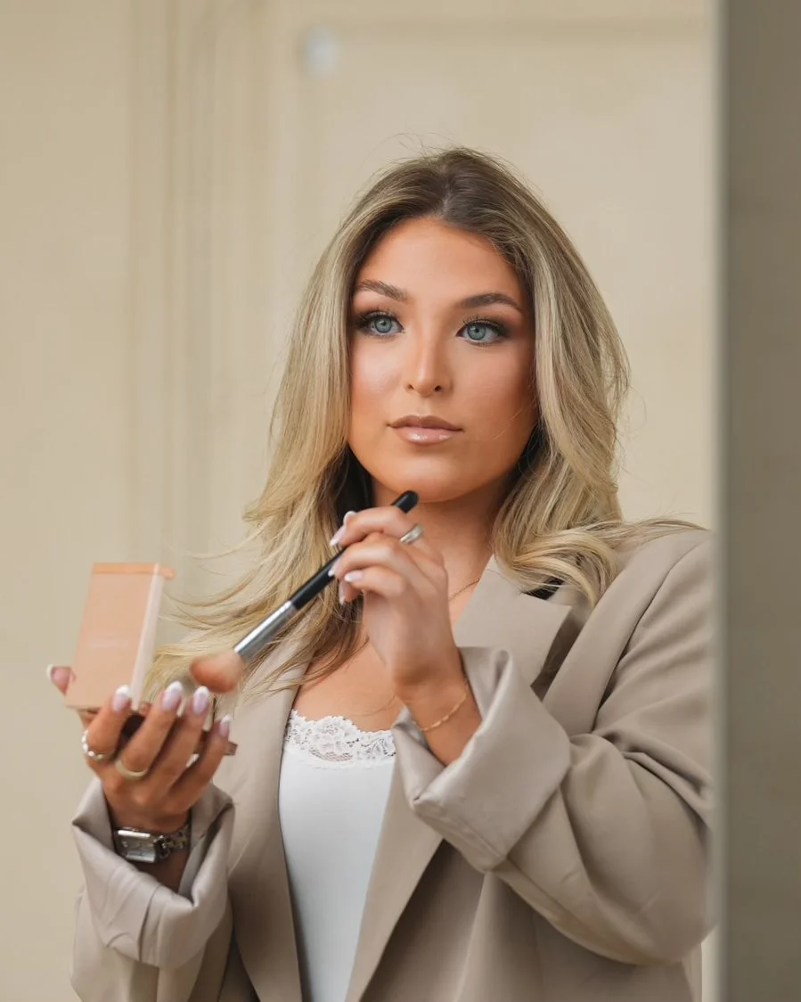 Alli applying makeup