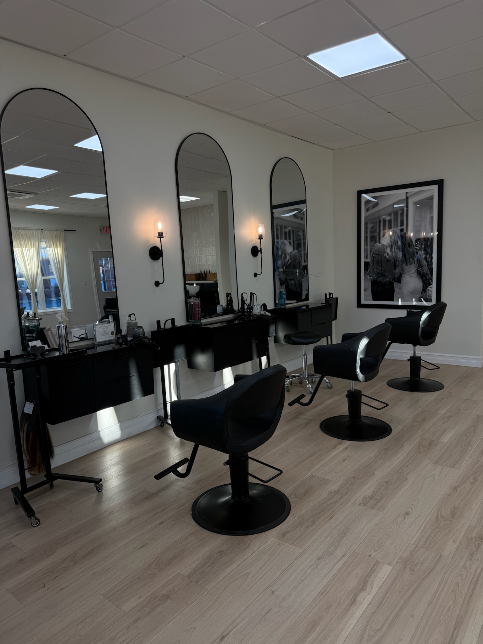 Styling stations with framed photography on the wall